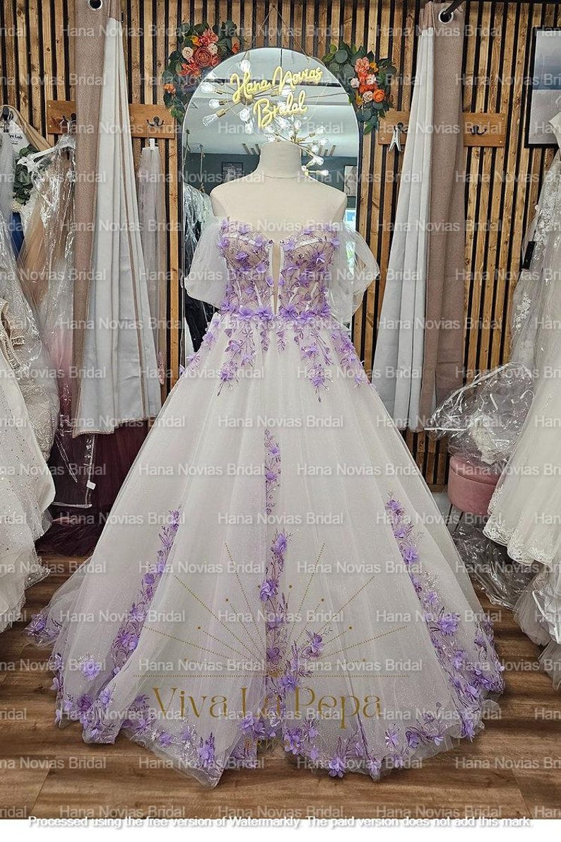 Wrenley – Whimsical Lavender 3D Floral Wedding Dress Bridal Gown with Off-Shoulder Sleeves and Tulle Skirt